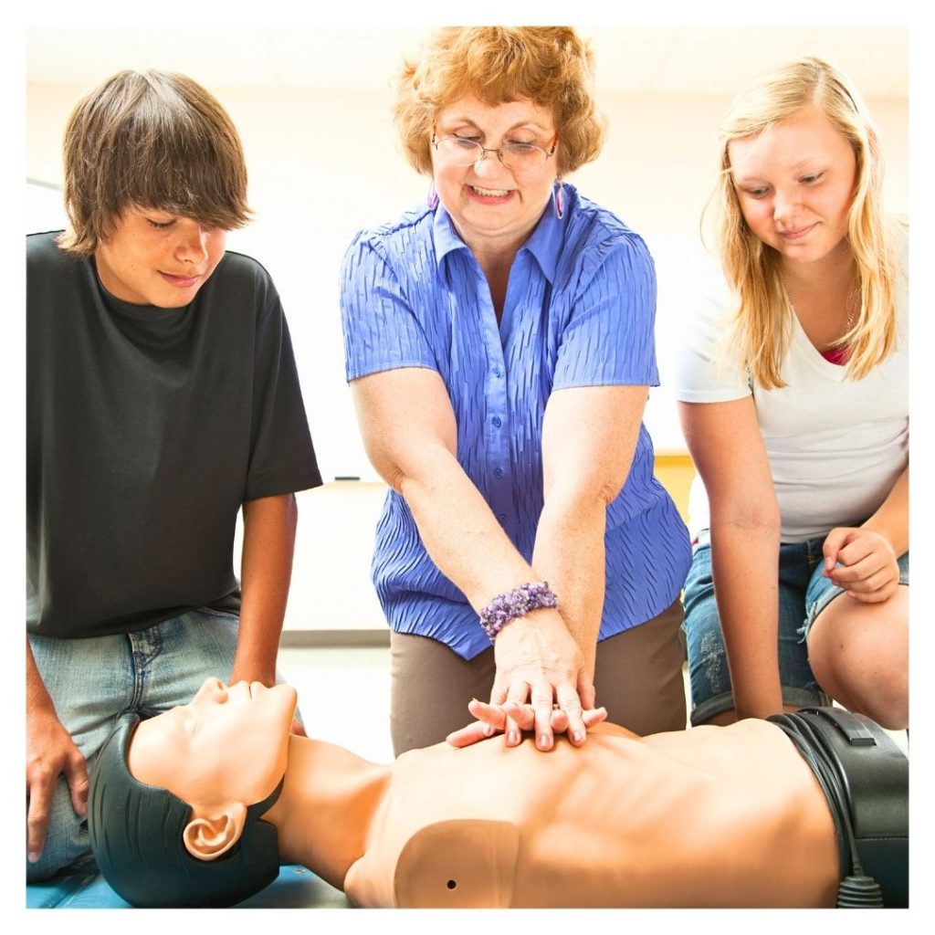 people learning CPR