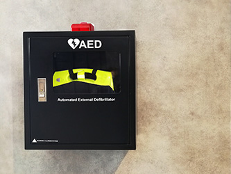 AED Pack in a sturdy metal box outside
