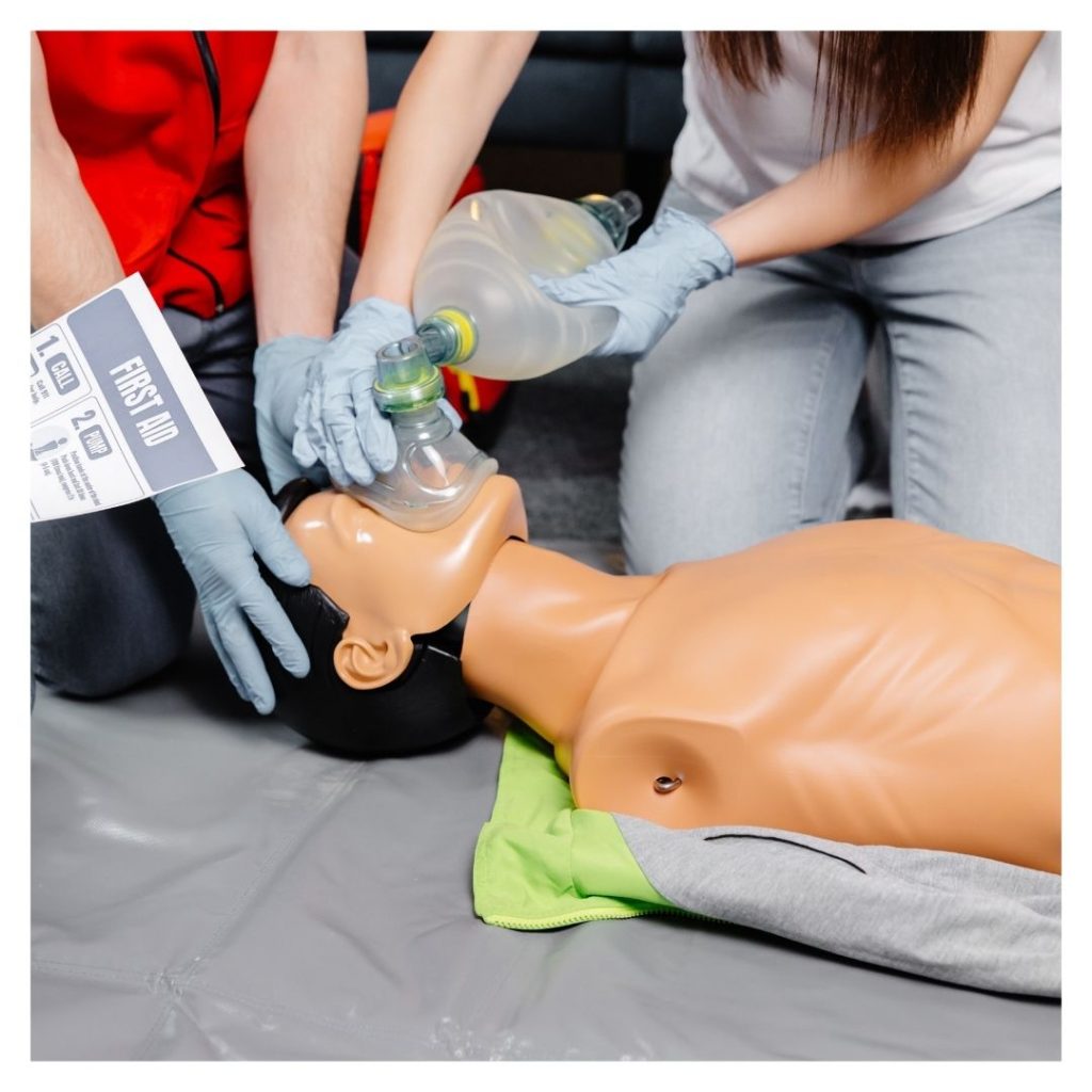 Practicing giving a person oxygen