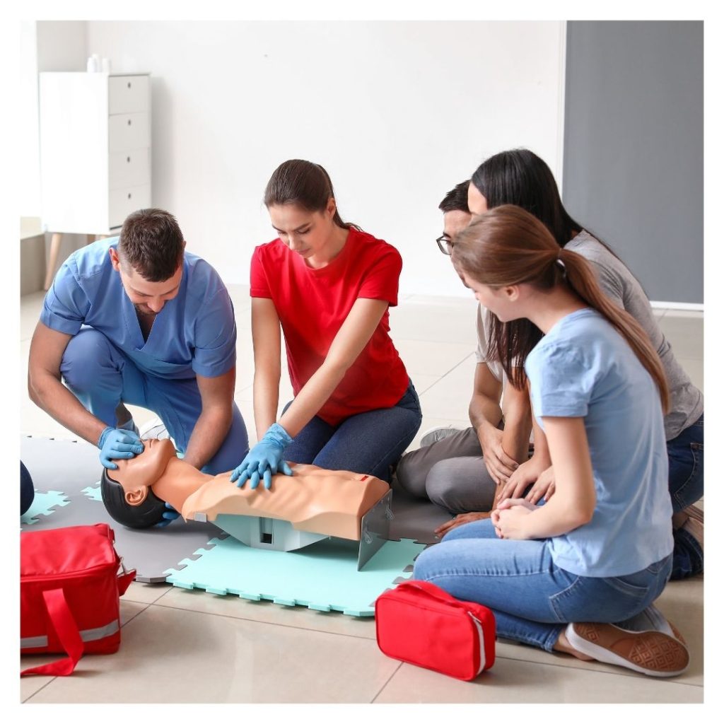 students practicing CPR