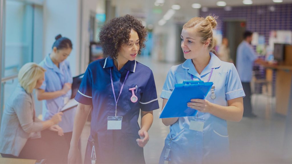 nurses walking together in hospital